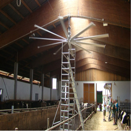 Large fan used in warehouse cooling to aid or replace the existing inefficient air conditioning system, helping to create a more comfortable working environment.